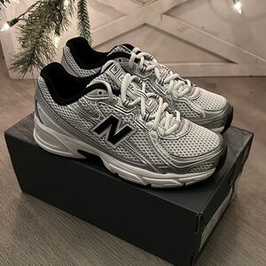 New Balance Silver and Black Athletic Shoes